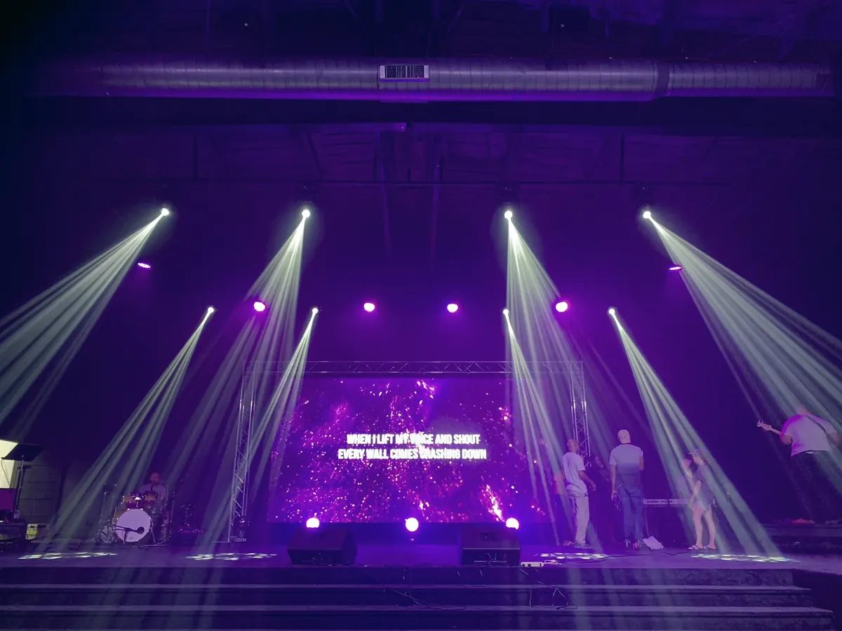 Worship lyrics on a church LED stage screen